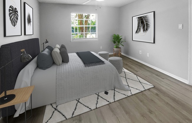 Bedroom with wood style plank flooring, ceiling fan, window