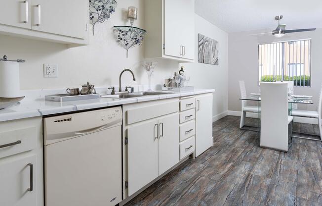 a kitchen with a stove and a sink