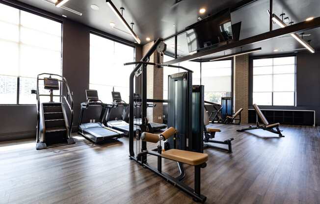 a gym with a lot of exercise equipment