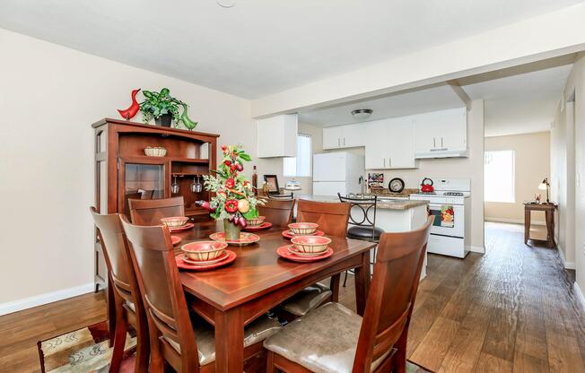 a kitchen with a dining room table