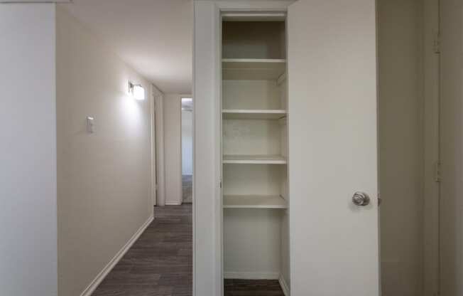 This is a photo of the entryway closet in the 970 square foot 2 bedroom, 2 bath apartment at Preston Park Apartments in Dallas, TX