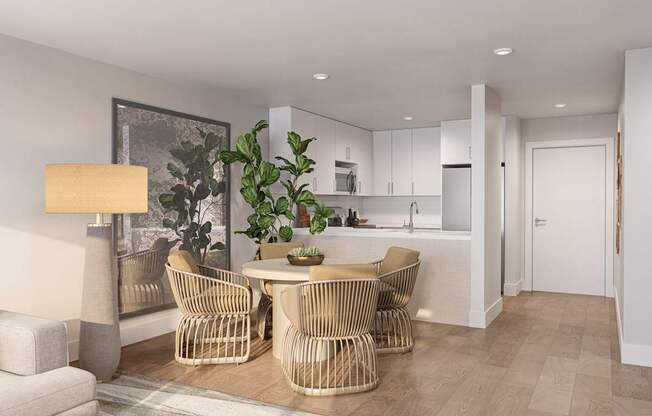 A modern dining room with a table set for four.