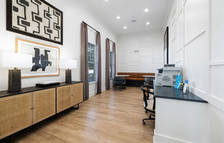 a dental office with white walls and wood flooring