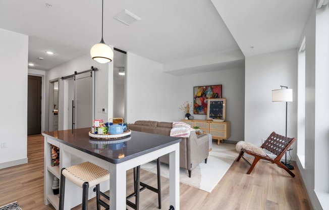 a living area with a dining table and a couch at The Mera, Minnesota