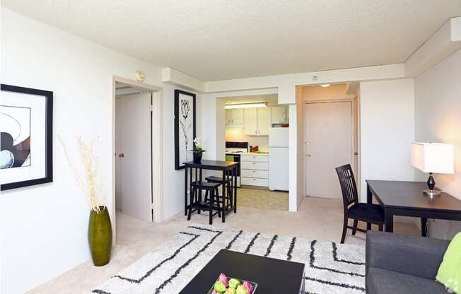 a living room with a dining room and a kitchen