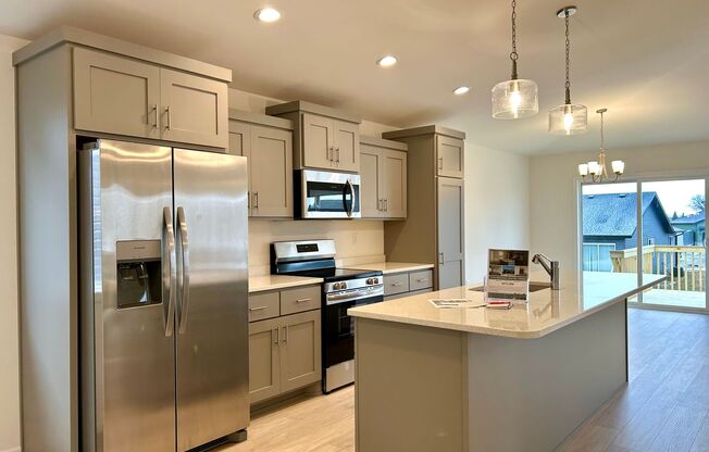 Spacious & Stylish 4-Bed Home with Modern Finishes and Attached 2-Stall Garage