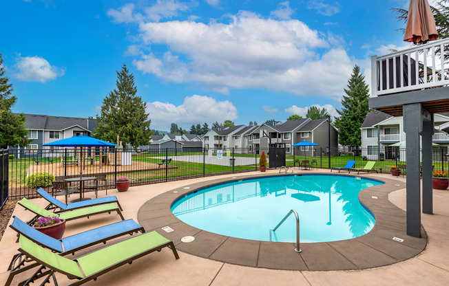 our apartments have a resort style pool with lounge chairs