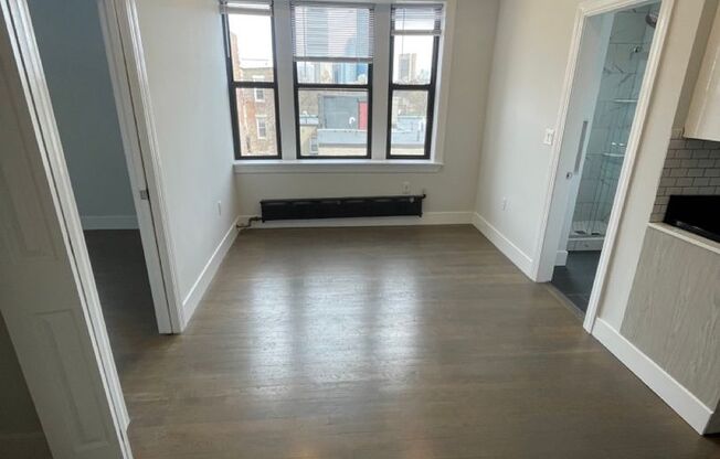 Avl NOW No Fee! Sunny 1BR with city skyline views, w/d in unit!