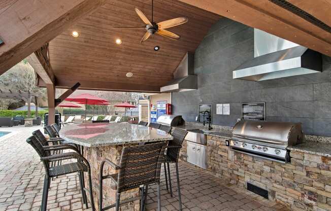Outdoor Kitchen and BBQ Area at Apartments on Satellite Blvd