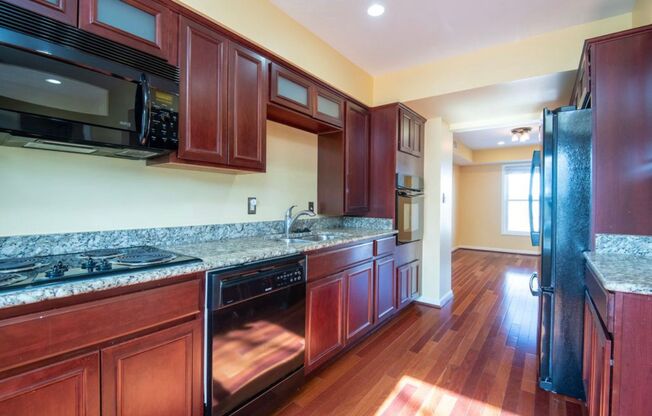 Bright 3 Bedroom Takoma Townhome with Parking, Yard, and Flexible Lower Level