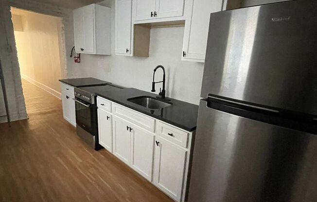 Cozy 2 bedroom 1 bathroom house with off-street parking