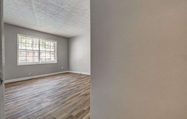 Welcome to 111 Burke Street, Unit A-7 — a beautifully renovated 2-bedroom, 1-bath home that's been updated from top to bottom.