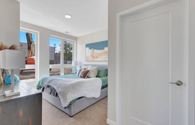 a bedroom with a large bed in a house