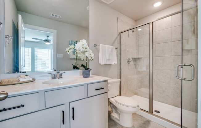 Canvas at Denton Large bathroom with walk in shower, build to rent, homes for rent in Denton, professionally managed rental home community, private yards, low maintenance, pet-friendly.