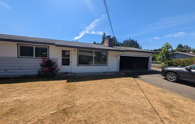 Rambler with large yard and storage shed...