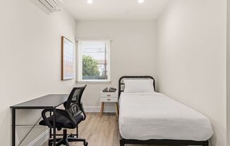 A 5 bedroom, 3 bathroom apartment with common areas and a fully functional kitchen at 1738 Kelton Ave.