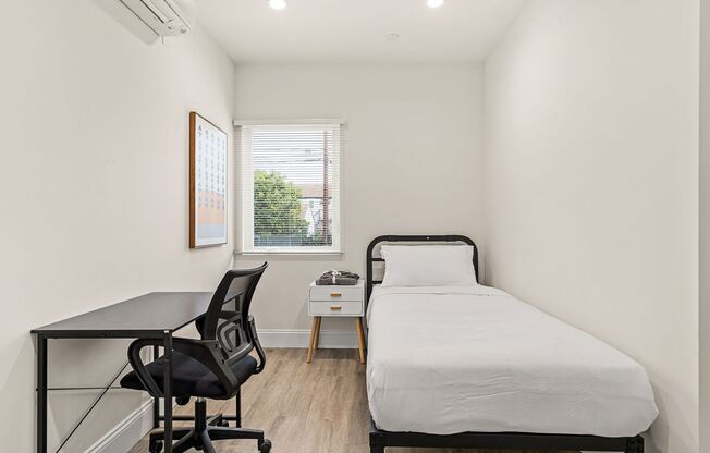 A 5 bedroom, 3 bathroom apartment with common areas and a fully functional kitchen at 1738 Kelton Ave.