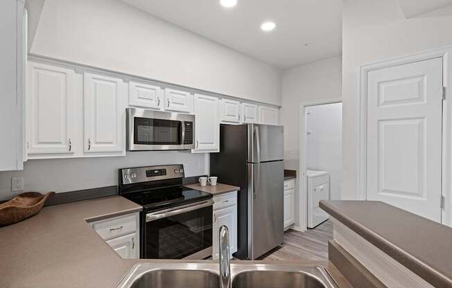 Stainless steel appliances - Grand Centennial Apartments