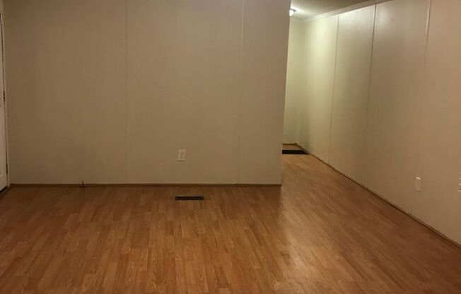 2 BDRM 2 BATH MOBILE HOME LOCATED IN THE COUNTRY. HEAT PUMP CENTRAL AIR. STOVE REF DW. WASHER & DRYER INCLUDED. LVT FLOORING THROUGHOUT. REMC & WELL. NO PETS ALLOWED. $1,200 MONTH, $1,200 DEPOSIT