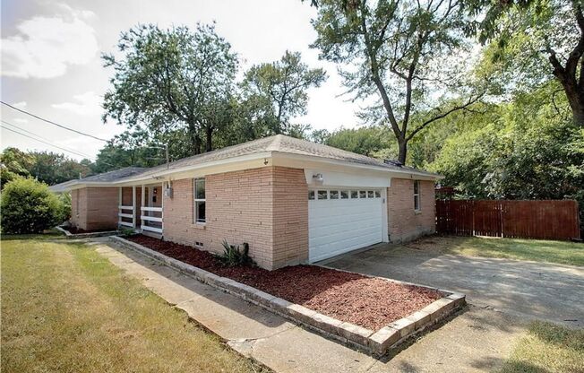 Completely updated 3 bed 2 full bath home on a large lot walking distance to schools.