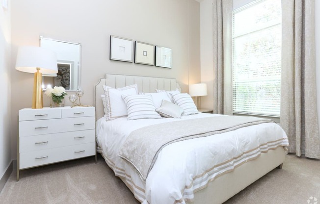 master bedroom with white comforter set