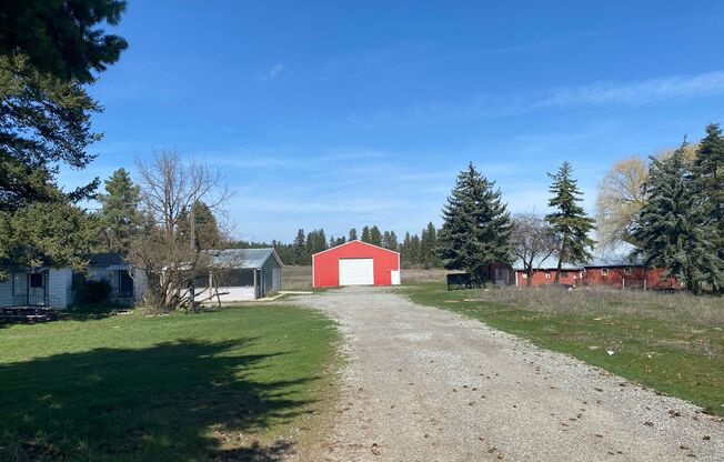 3 bed house plus studio apartment/ shop and barn on horse property with almost 20 acres-Deer Park