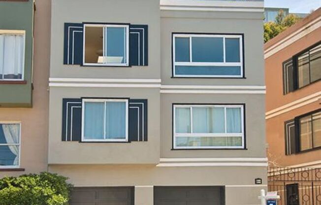 Ashbury Heights: Bright, Remodeled & Unfurnished Top Floor Condo w/ Sweeping Views, Garden & Compact Parking