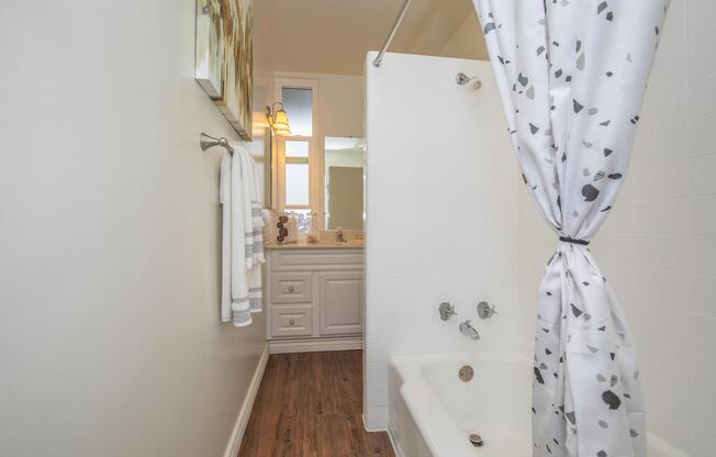 a man standing in front of a mirror posing for the camera