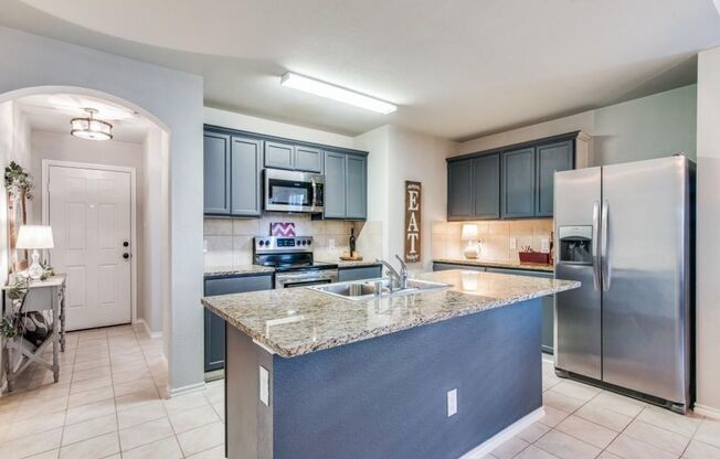 This beautiful 4 bedroom, 2 bath home is located within walking distance to pool, parks & playgrounds
