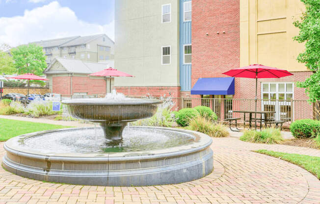 outdoor water fountain feature and sitting area