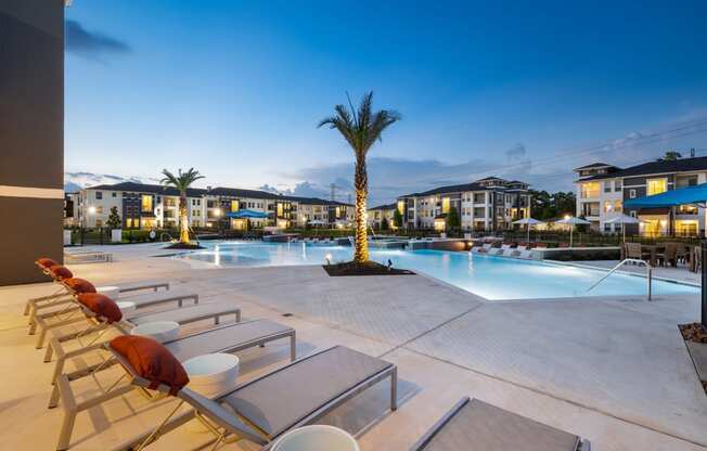 Infinti Edge style pool with beach entry and heated spa