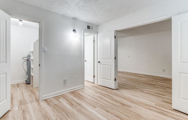Apartments in Haltom City, TX for Rent - Fusion Fort Worth Apartments - Renovated Interior with Hardwood Inspired Flooring