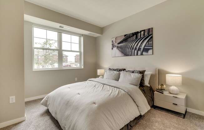 Bedroom with walk-in closet at Ascend at Woodbury in Woodbury MN