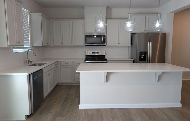 Elegant, Move In ready townhome located in the Cheyney Community.
