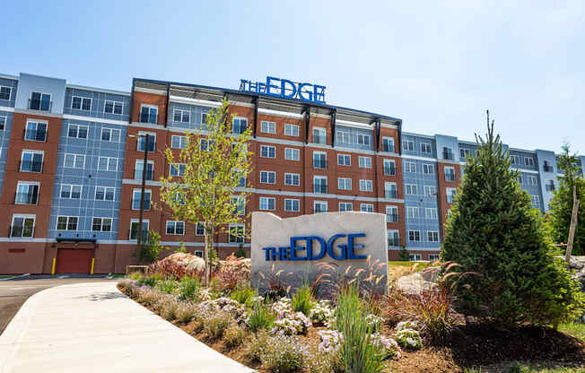 The front of a building with a sign that says The Edge.