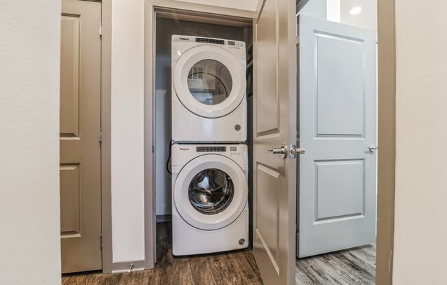 a front loading washer and dryer in a laundry room at Canter, Ocala, Florida