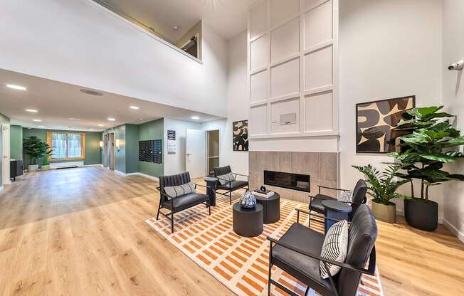 Lobby interior with seating and a fireplace