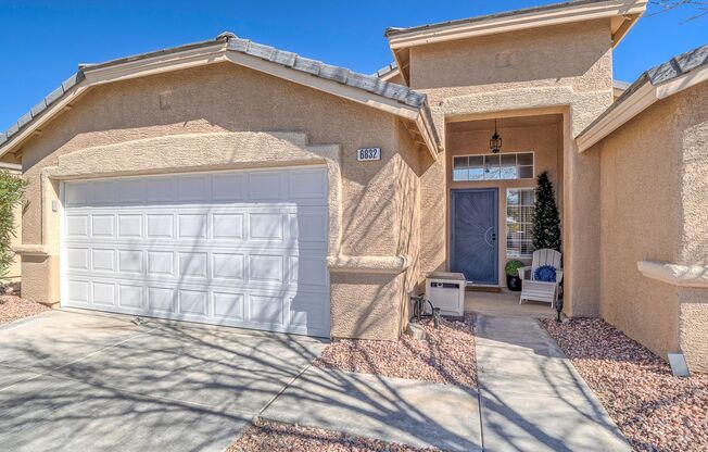 Beautiful single-story open-concept partially furnished home with a sparkling pool and no rear neighbors!