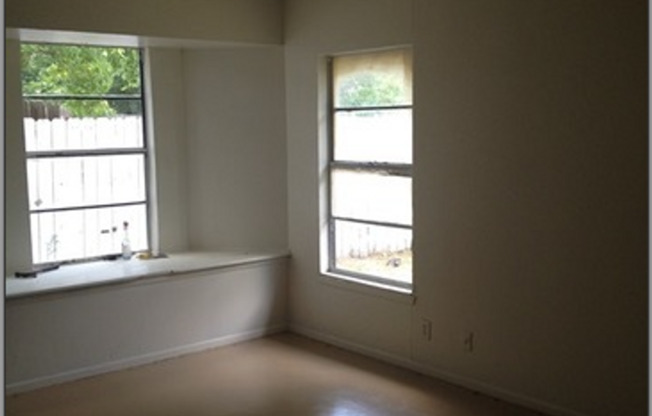 Large 2/2 duplex with a 2 car carport