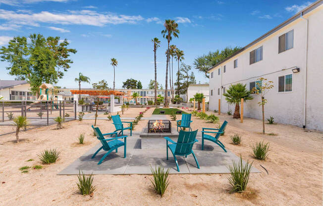 an outside patio with chairs and a fire pit at Sunnymead Apts Apartments, Moreno Valley, 92553