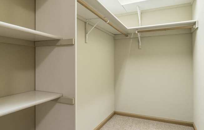 Interiors-Large walk-in closet with built-in shelving at Stone Ridge Estates in south Lincoln NE