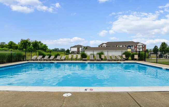 Swimming pool with lounge area and seating at The Reserves of Thomas Glen, Shepherdsville, KY, 40165