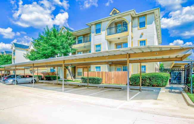 Covered carports at Tuscany Square Apartments in North Dallas, TX. Now leasing studios, 1 and 2 bedroom apartments.