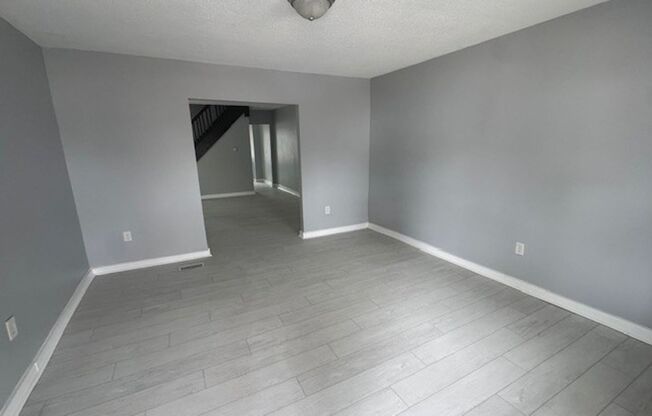 Completely Renovated 3BR/1BA Townhome located near Downtown Indy.