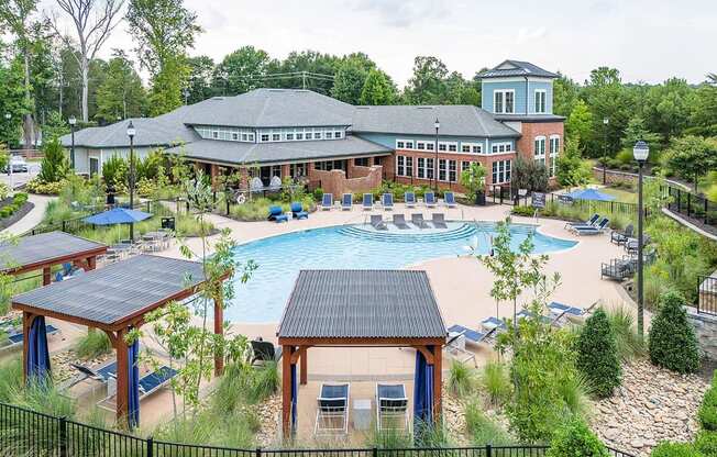 an aerial view of the resort with a swimming pool