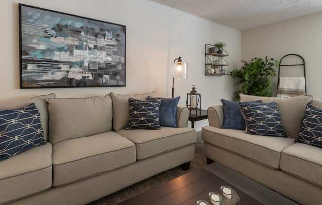 This is a photo of the living room of the 1100 square foot 2 bedroom Kettering floor plan at Washington Park Apartments in Centerville, OH.