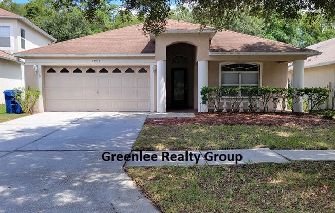 Gorgeous 4 Bedroom/2 Bathroom Home in Suncoast Lakes - Community Pool - Lawn Care Included!