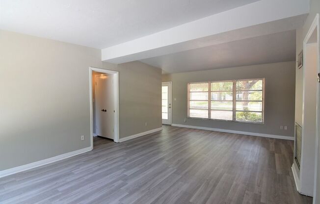 UPDATED 3br 2ba near Orlando's HOURGLASS DISTRICT, with 2 car carport and FENCED YARD!