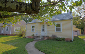 Charming 2 bedroom 1 bath cottage just 1/2 mile from UNCG and Downtown! Large fenced-in yard and storage