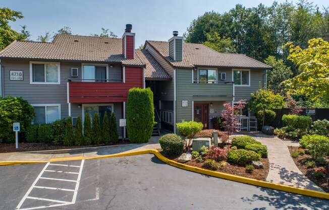 the view of a house with a driveway and landscaping in front of it at Quartz Creek, Washington, 98043